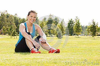 Happy woman jogger training in the park. Healthy lifestyle and p