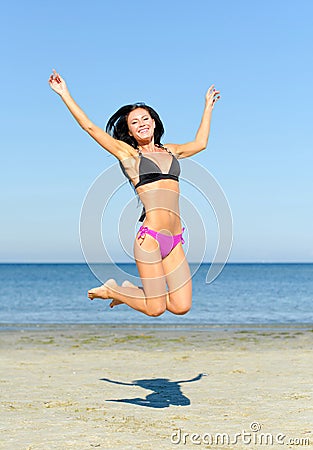 Happy woman jumping