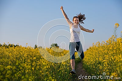 Happy woman jumps to the sky