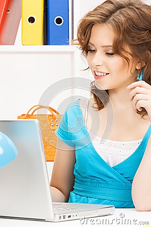 Happy woman with laptop computer