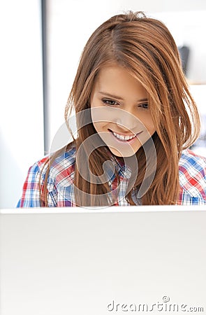 Happy woman with laptop computer