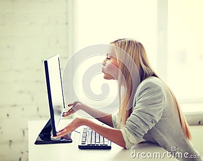 Happy woman with laptop computer