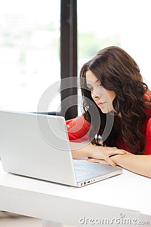 Happy woman with laptop computer