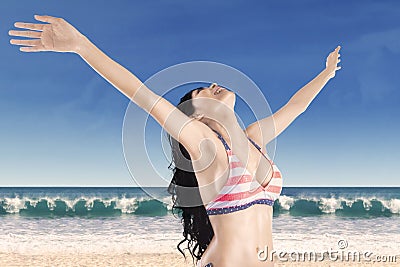 Happy woman with outstretched arms