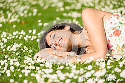 Happy woman relaxing on nature