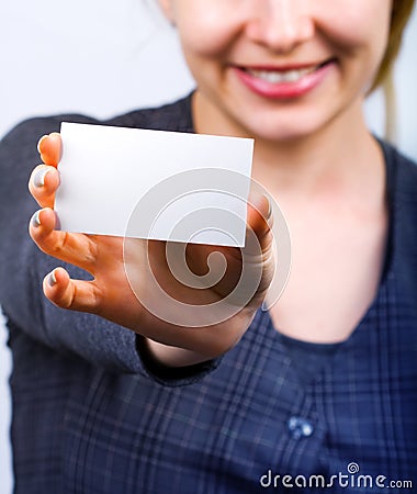 Happy woman showing blank business card