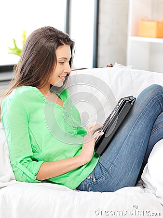 Happy woman with tablet pc computer