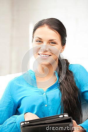 Happy woman with tablet pc computer