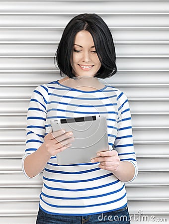 Happy woman with tablet pc computer