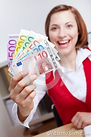 Happy woman winning Euro money