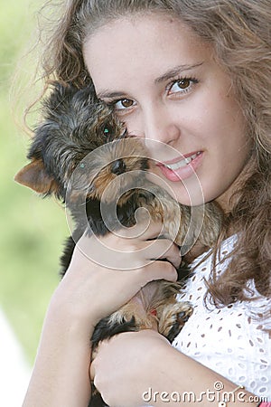Happy woman with yorkshire terrier