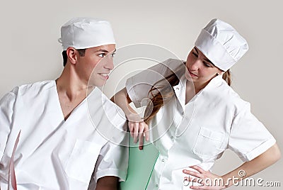 Happy young doctor and a nurse at the hospital