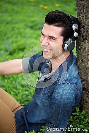 Happy young man relaxing outdoors