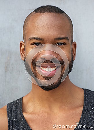 Happy young man smiling