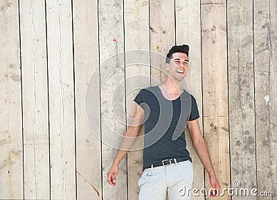 Happy young man standing outdoors