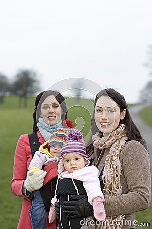 Happy Young Mothers With Their Babies