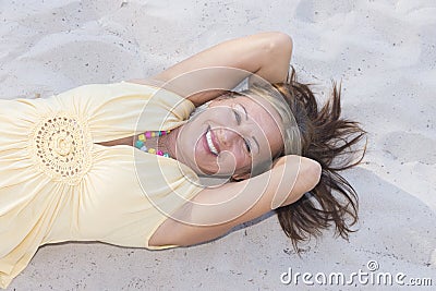 Hapyy retired woman relaxed at beach