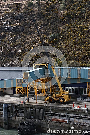 Harbour view with lifting equipement and sea docking buoy for ferries