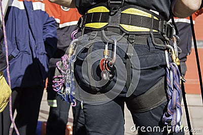 Harness with rescue equipment