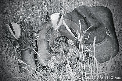 Hat and boots in the grass (BW)