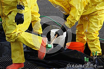 HAZMAT Team Members Clean Up Boots