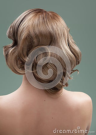 Head and shoulders back image of a young woman