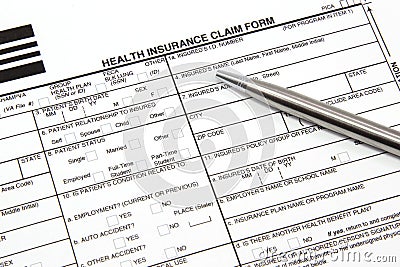 Health Insurance Claim Form with Silver Pen
