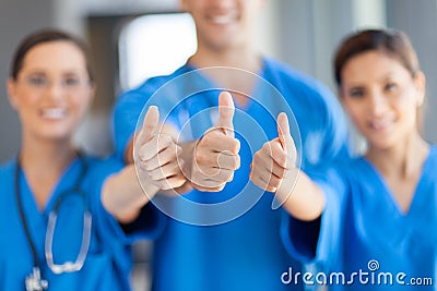 Healthcare workers thumbs up