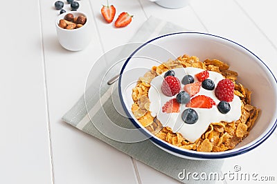 Healthy breakfast with cereals and berries in an e
