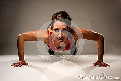 Healthy Fitness Woman doing a Pushup