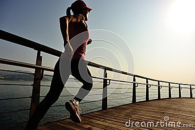 Healthy lifestyle woman running seaside