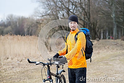 Healthy lifestyle, young man biking