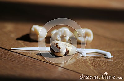 Healthy teeth and cavity tooth on brown background