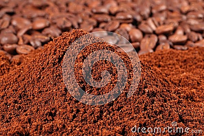 Heap of ground coffee and beans