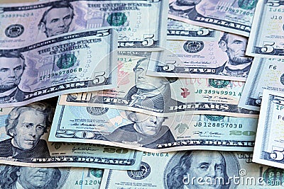 Heap of US dollars, notes of different values