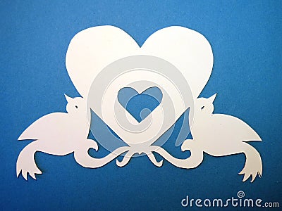 Heart with birds. Paper cutting.