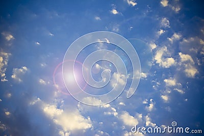 Heavenly bright blue sky with sun flare