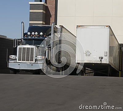 Heavy goods truck at loading bay