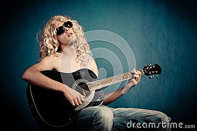 Heavy metal rock star with guitar parody