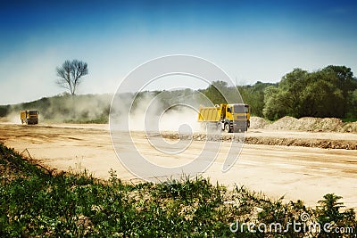 Heavy truck in dusty road