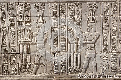 Hieroglyphic carvings on an Egyptian temple wall