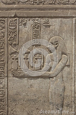 Hieroglyphic carvings on an Egyptian temple wall