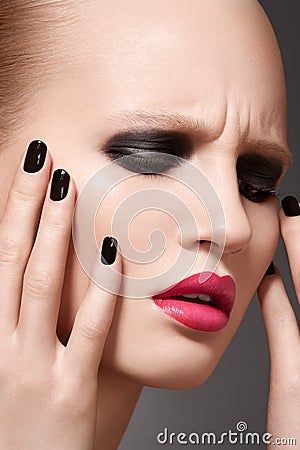 High fashion model with make-up and nails manicure