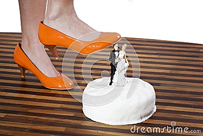 High heels smashing a cake