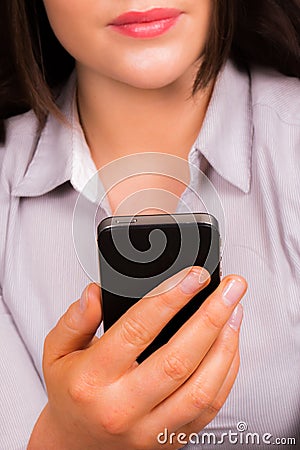 Beautiful young business women with iphone mobile device