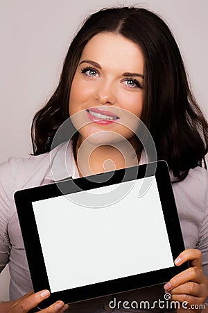 Beautiful young female using an ipad tablet device