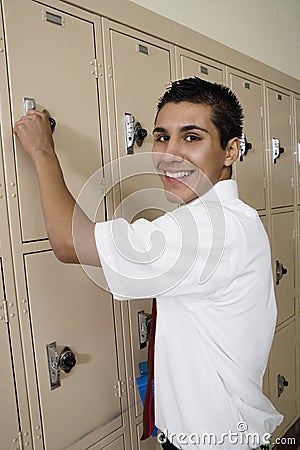High School Boy Opening Locker