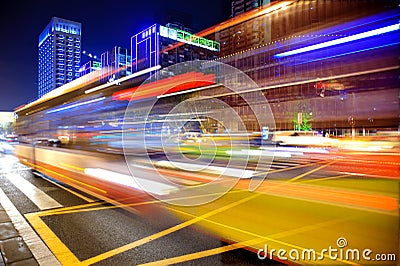 High speed and blurred bus light trails