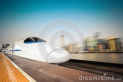 High speed train and modern urban background