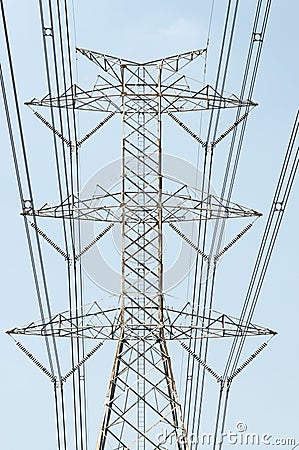 High-voltage tower with blue sky